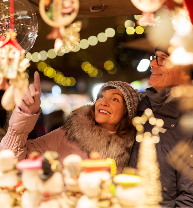 Lady looking at Christmas decorations