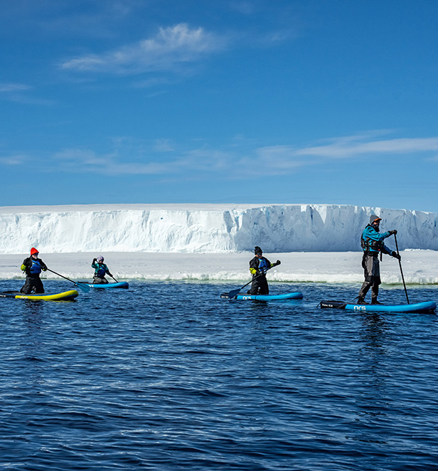 Scenic Eclipse II guests kayaking in Commonwealth Bay, East Antarctica