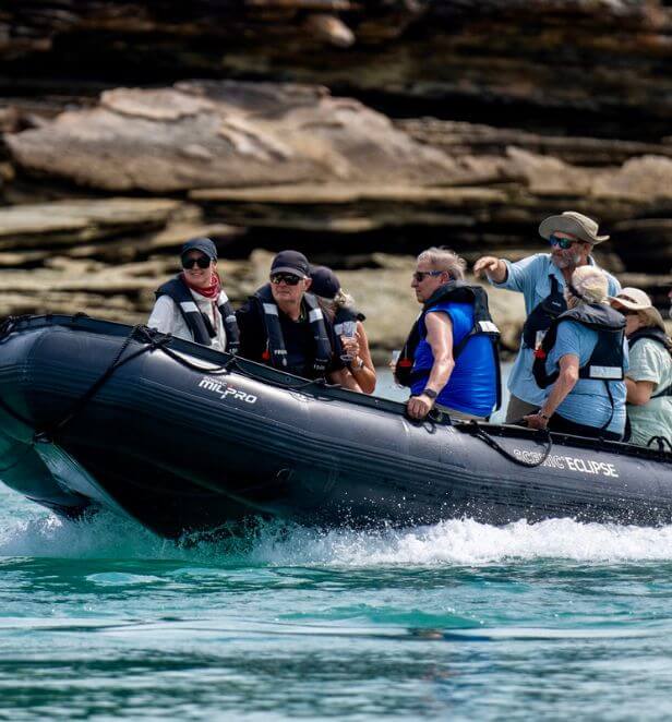 Scenic Eclipse Zodiac near rocky shore, Kimberley