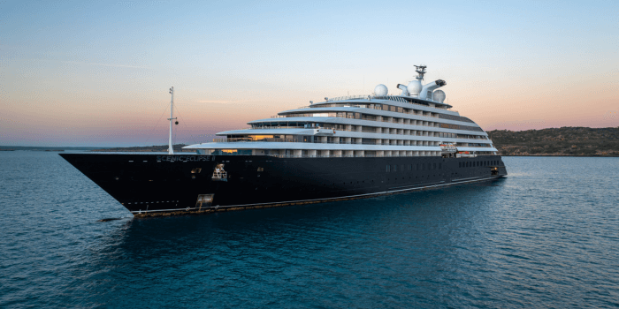 Scenic Eclipse II luxury yacht sailing at sunset